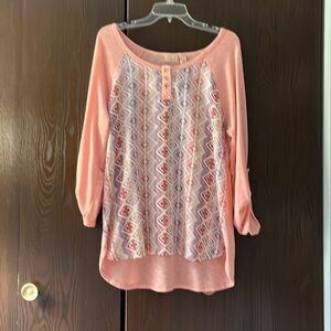 NorthCrest Aztec patterned light orange top.